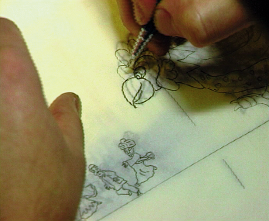 Animator reviewing model sheet for EDEN